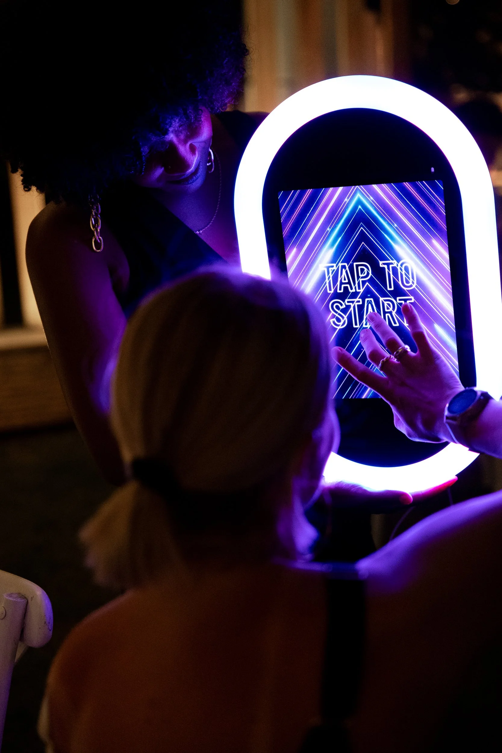 Attendant assisting guests at an event